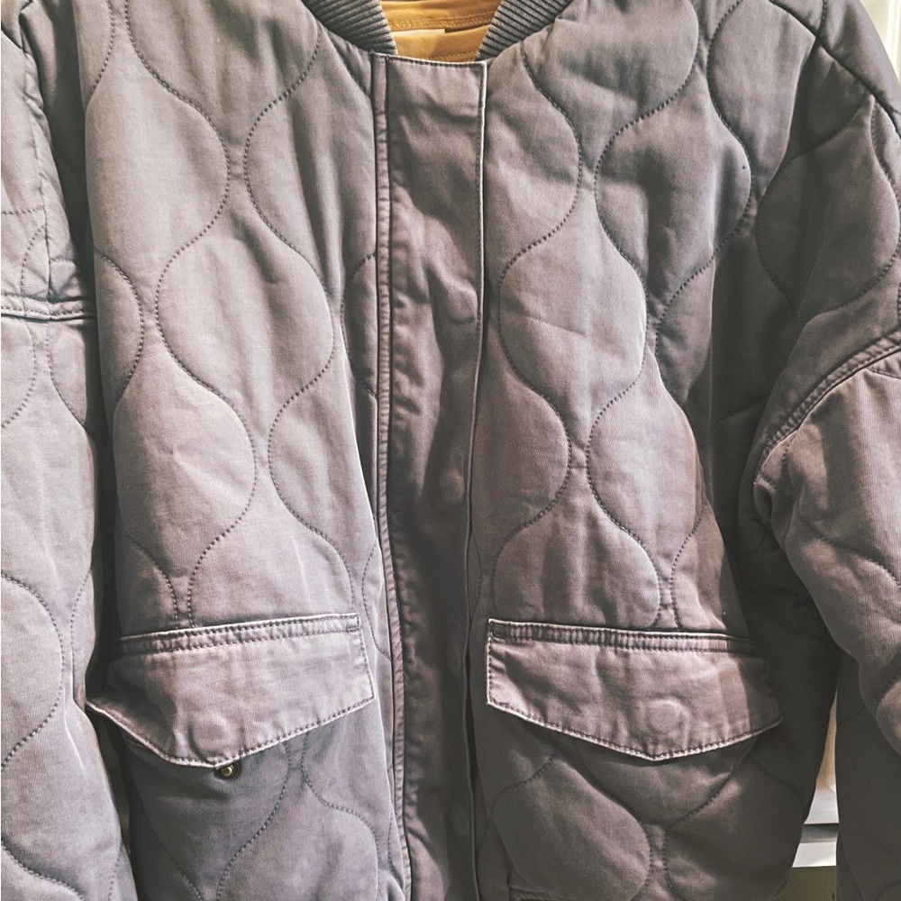Blue denim bomber jacket — never worn.